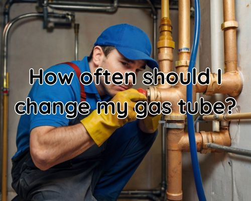 a plumber working on changing gas tubes